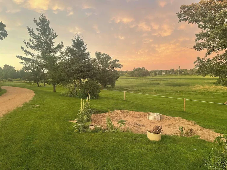 Sunset over the fire pit area on the farm